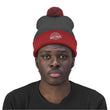 Load image into Gallery viewer, Man with grey and red Saltbox pom pom beanie on head