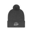 Load image into Gallery viewer, Grey Saltbox pom pom beanie laying down