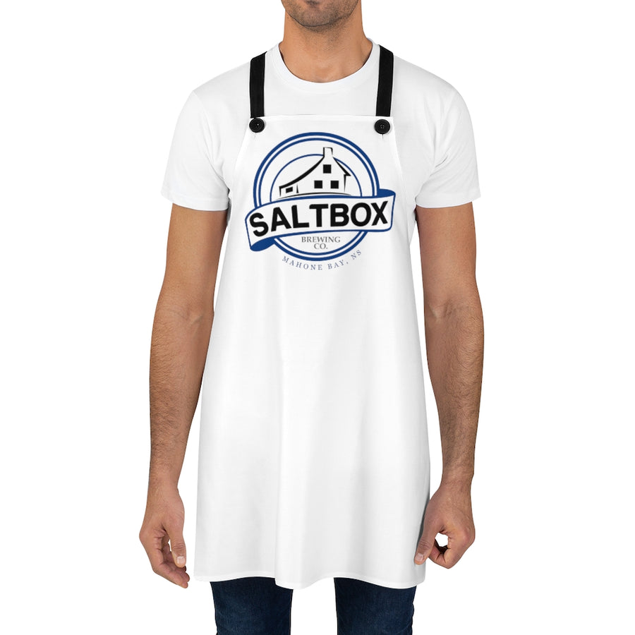 Man wearing white apron with Saltbox logo on it