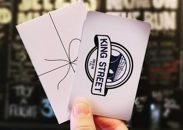 Hand Holding King Street Beer Gift Cards